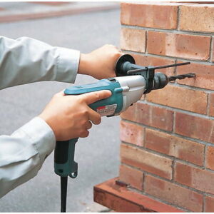 Perceuse à percussion 720 W ∅ 13 mm pour travaux de perçage dans le béton et la pierre