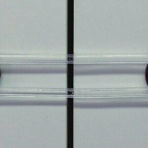 Bloque meuble adhésif translucide – Sécurité et maintien pour armoires et placards