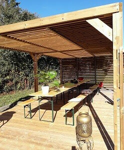 Pergola Thermauvent - Bois thermochauffé - Ventelles mobiles sur le toit et 1 paroi - 3,41 x 6,14 m