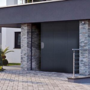 Porte de garage sectionnelle à refoulement latéral en acier isolé sur Mesure