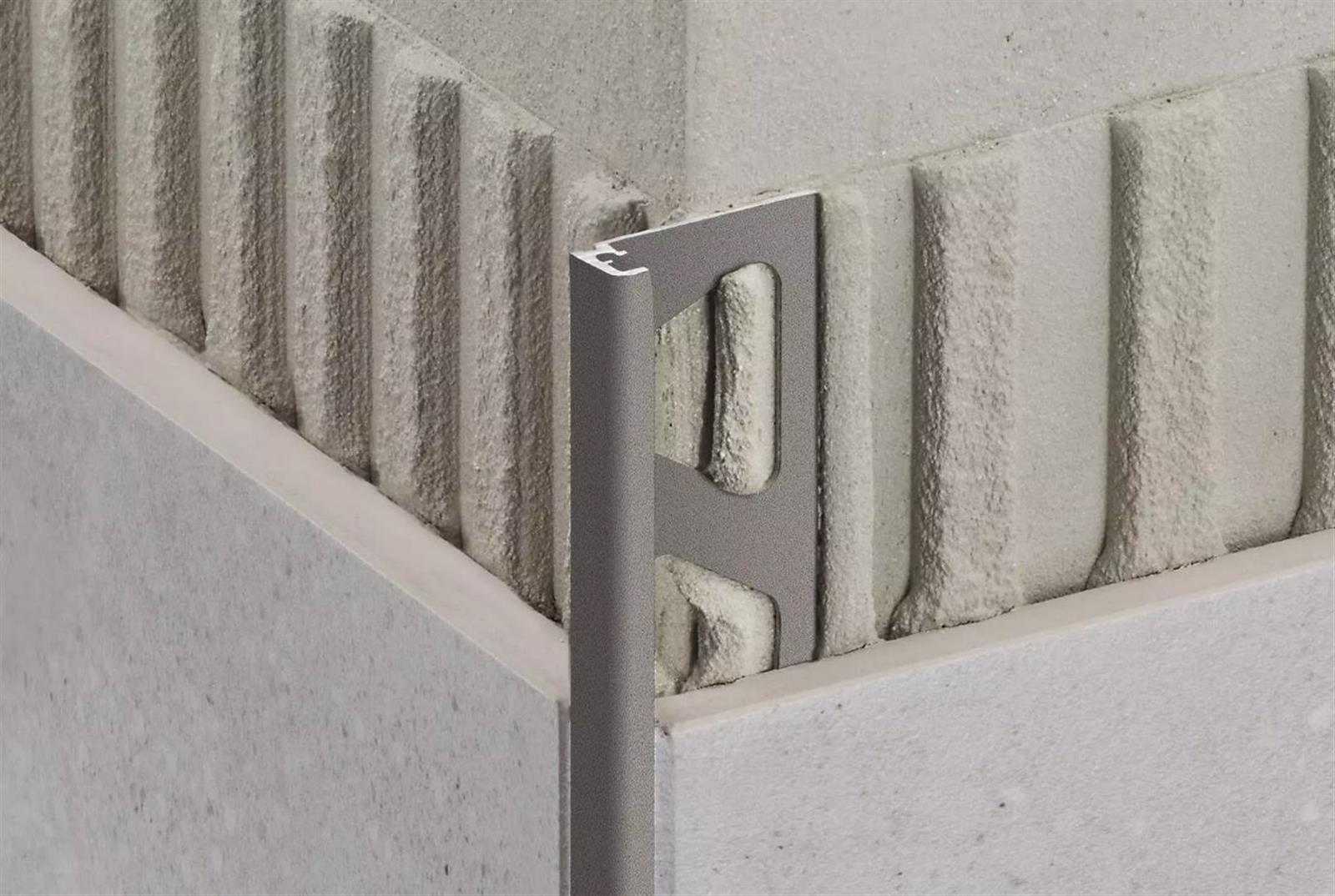 Profilé décoratif à finition structurée JOLLY-TS 125 - Coloris: gris pierre - hauteur: 12,5mm - longueur: 2,5ML